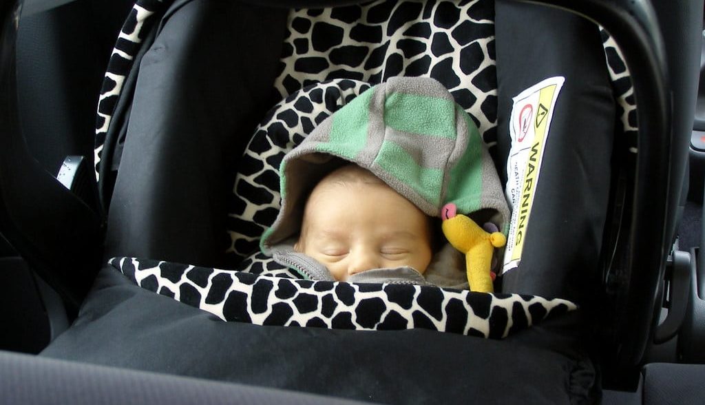 What can calm a baby while driving, or while in the car?